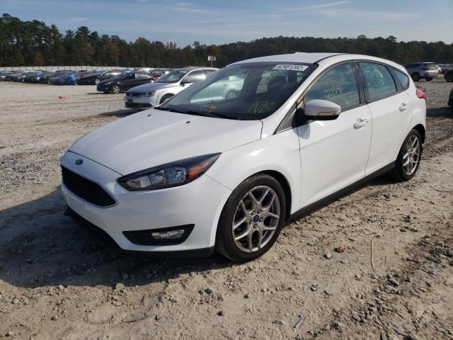 Photo 2 from auction – 2015 FORD FOCUS SE with VIN 1FADP3K21FL283213
