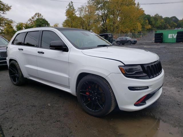 JEEP GRAND CHER 2014 with VIN 1C4RJFDJ9EC335225 - Photo from auction