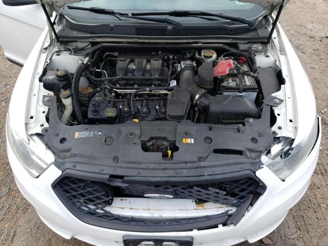 Photo 7 from auction – 2014 FORD TAURUS POL with VIN 1FAHP2MK7EG151234