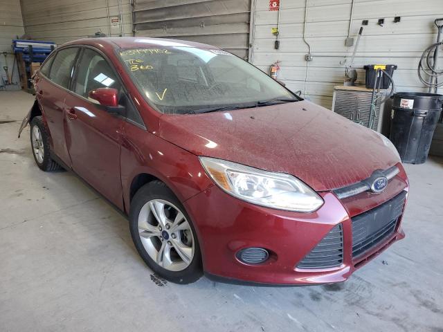 FORD FOCUS SE 2014 with VIN 1FADP3F24EL381516 - Photo from auction