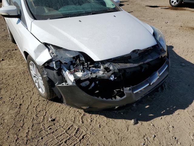 Photo 9 from auction – 2012 FORD FOCUS SEL with VIN 1FAHP3M29CL333995