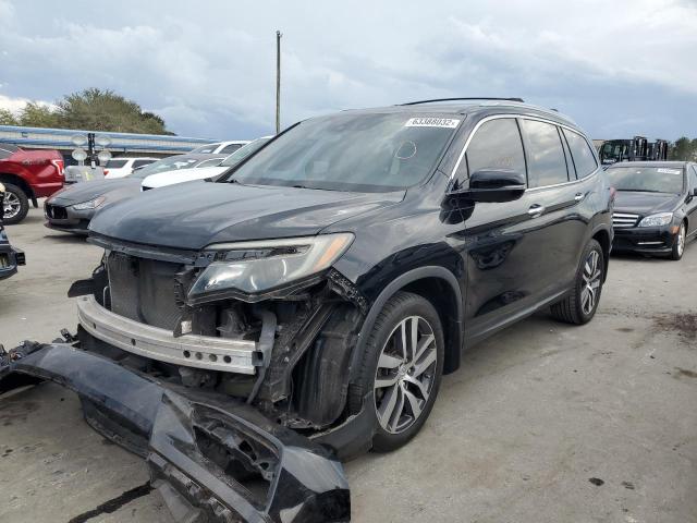 Photo 2 from auction – 2017 HONDA PILOT TOUR with VIN 5FNYF5H92HB011693