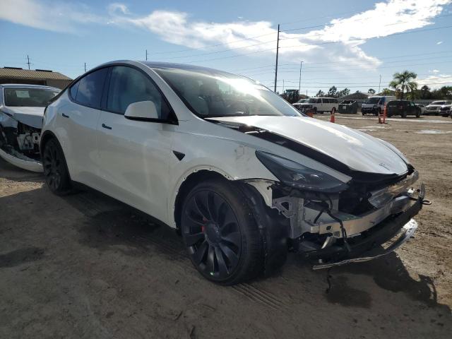 TESLA MODEL Y 2022 with VIN 7SAYGDEF3NF398142 - Photo from auction