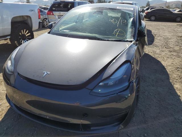 Photo 9 from auction – 2022 TESLA MODEL 3 with VIN 5YJ3E1EB1NF206614