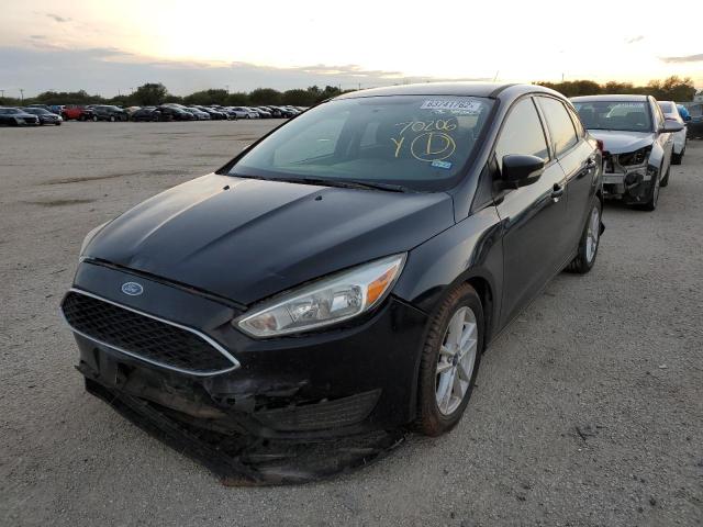 Photo 2 from auction – 2016 FORD FOCUS SE with VIN 1FADP3F20GL314852