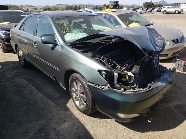 TOYOTA CAMRY LE 2003 with VIN 4T1BE32K23U706969 - Photo from auction