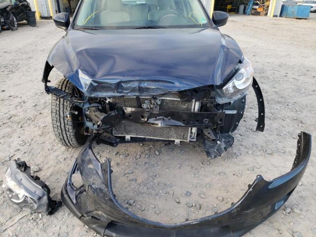 Photo 9 from auction – 2014 MAZDA CX-5 SPORT with VIN JM3KE2BE7E0423686
