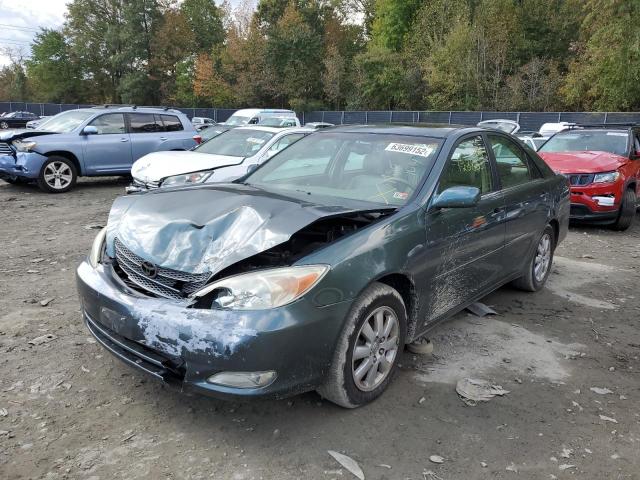 Photo 2 from auction – 2003 TOYOTA CAMRY LE with VIN JTDBE30K530165981