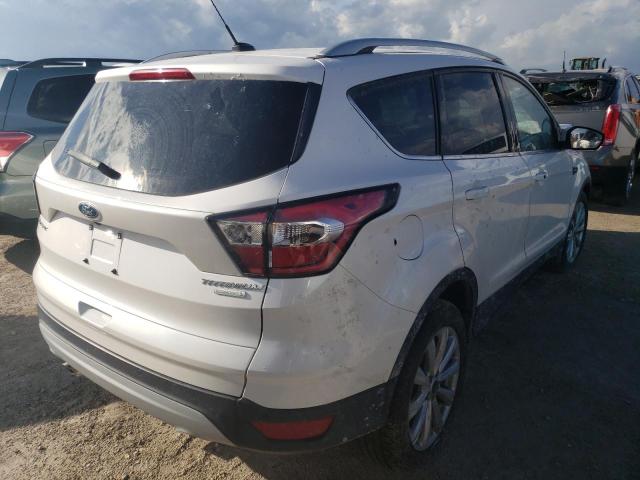 Photo 4 from auction – 2017 FORD ESCAPE TIT with VIN 1FMCU0J94HUC19428