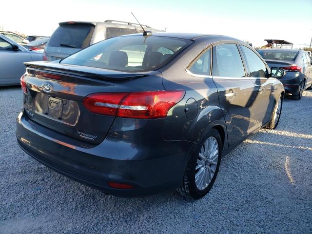 Photo 4 from auction – 2015 FORD FOCUS TITA with VIN 1FADP3J25FL322144