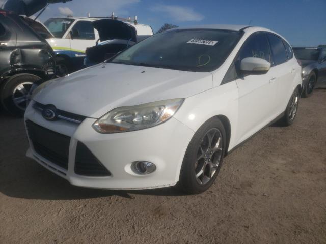 FORD FOCUS SE 2014 with VIN 1FADP3K29EL337517 - Photo from auction
