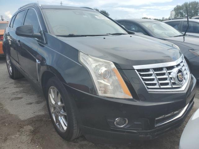 CADILLAC SRX PERFOR 2014 with VIN 3GYFNCE31ES645377 - Photo from auction