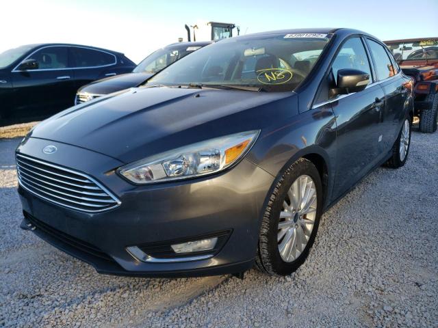 Photo 2 from auction – 2015 FORD FOCUS TITA with VIN 1FADP3J25FL322144