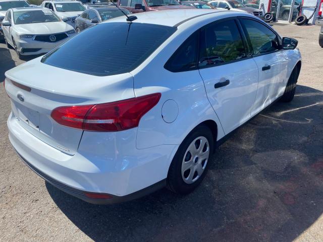Photo 4 from auction – 2015 FORD FOCUS S with VIN 1FADP3E27FL248879