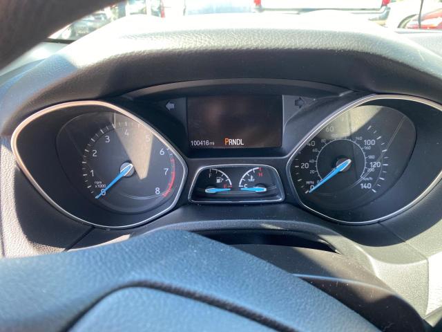 Photo 8 from auction – 2015 FORD FOCUS S with VIN 1FADP3E27FL248879