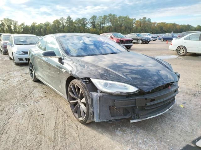 TESLA MODEL S 2013 with VIN 5YJSA1CGXDFP03679 - Photo from auction