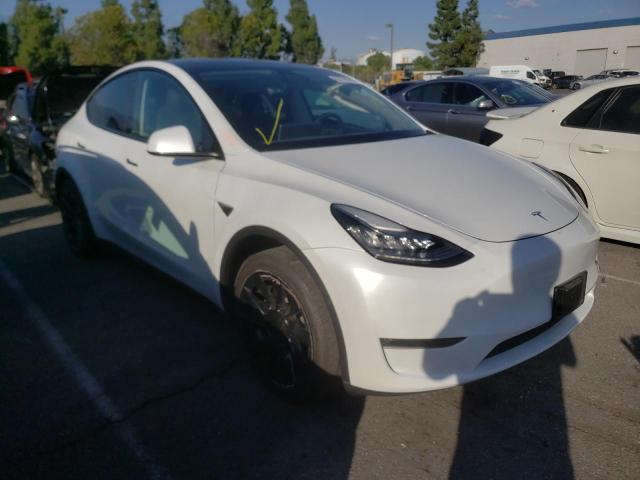 TESLA MODEL Y 2020 with VIN 5YJYGDEEXLF014360 - Photo from auction