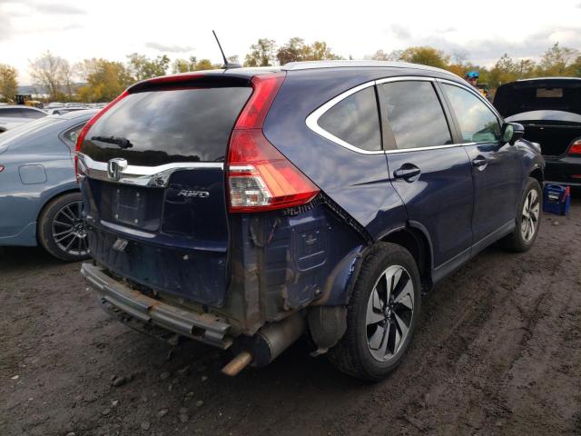 Photo 4 from auction – 2015 HONDA CR-V TOURI with VIN 5J6RM4H94FL099056