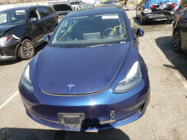 Photo 5 from auction – 2022 TESLA MODEL 3 with VIN 5YJ3E1EA4NF142687