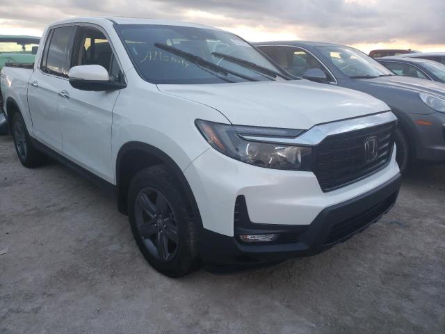 Photo 9 from auction – 2021 HONDA RIDGELINE with VIN 5FPYK3F78MB005044