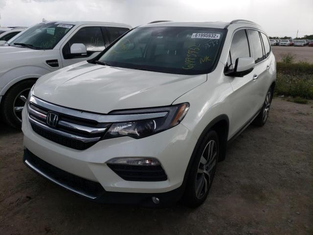 Photo 2 from auction – 2018 HONDA PILOT ELIT with VIN 5FNYF6H08JB023490