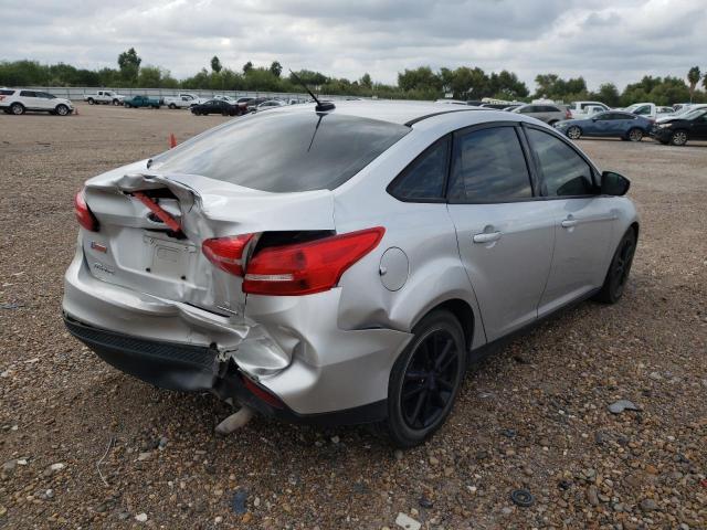 Photo 4 from auction – 2016 FORD FOCUS SE with VIN 1FADP3F26GL213685