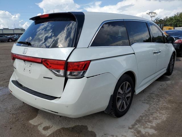 Photo 4 from auction – 2014 HONDA ODYSSEY TO with VIN 5FNRL5H92EB089075
