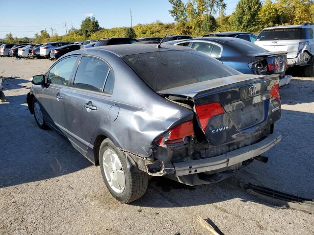 Photo 3 from auction – 2006 HONDA CIVIC HYBR with VIN JHMFA36236S014620