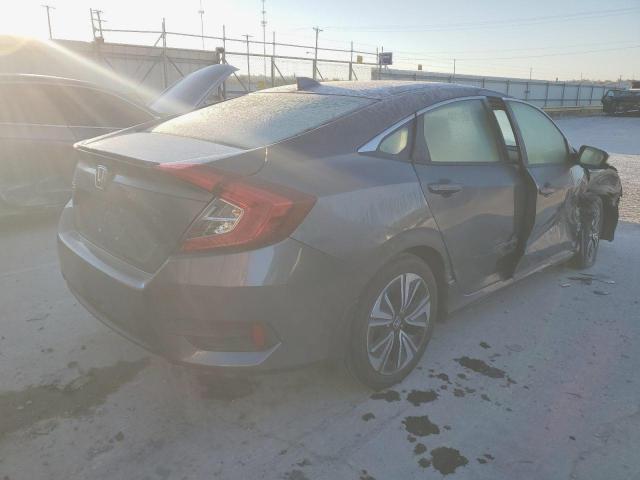 Photo 4 from auction – 2018 HONDA CIVIC EX with VIN JHMFC1F35JX009597