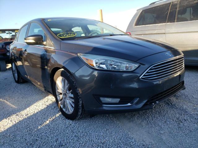 Photo 1 from auction – 2015 FORD FOCUS TITA with VIN 1FADP3J25FL322144