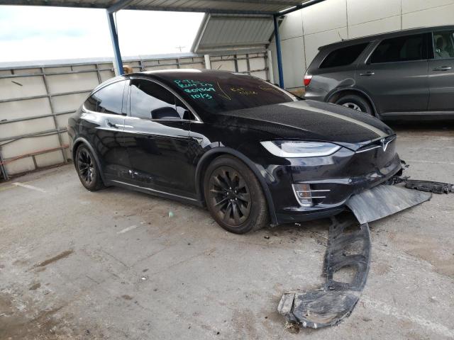 TESLA MODEL X 2017 with VIN 5YJXCBE28HF050122 - Photo from auction