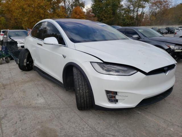 TESLA MODEL X 2017 with VIN 5YJXCBE28HF043607 - Photo from auction