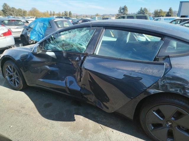 Photo 9 from auction – 2022 TESLA MODEL 3 with VIN 5YJ3E1EB1NF363513