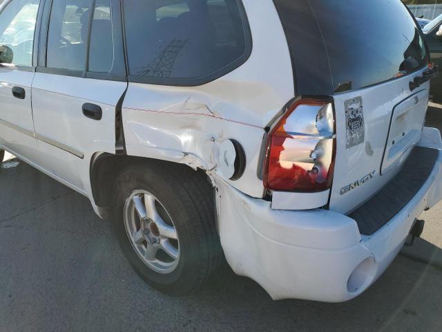 Photo 9 from auction – 2006 GMC ENVOY with VIN 1GKDT13S462209352