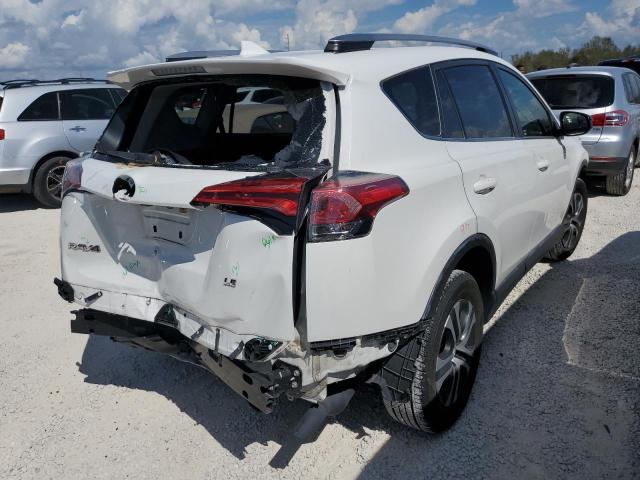 Photo 4 from auction – 2018 TOYOTA RAV4 LE with VIN JTMZFREV2JJ180754