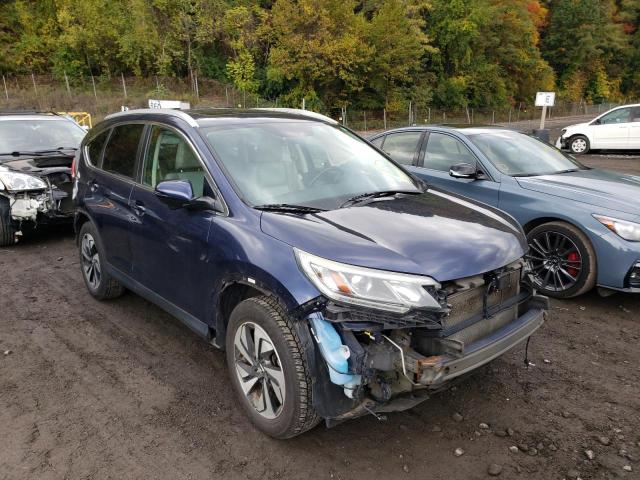 HONDA CR-V TOURI 2015 with VIN 5J6RM4H94FL099056 - Photo from auction