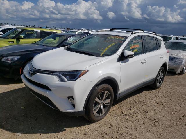 Photo 2 from auction – 2016 TOYOTA RAV4 XLE with VIN 2T3WFREV9GW289127