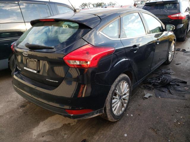 Photo 4 from auction – 2016 FORD FOCUS TITA with VIN 1FADP3N21GL332620