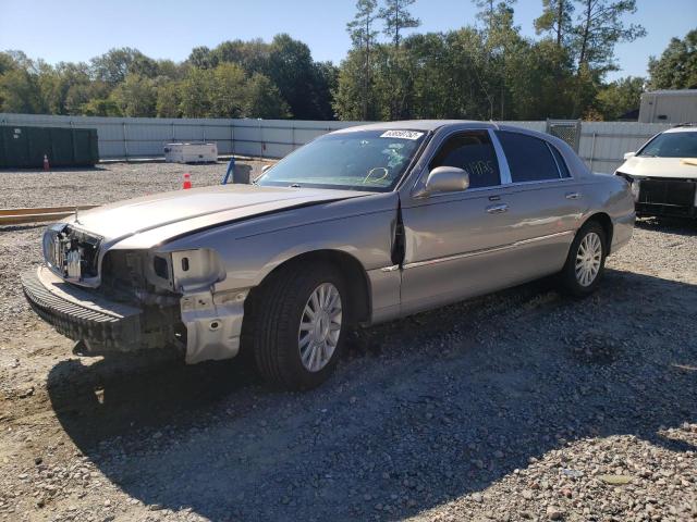 Photo 2 from auction – 2003 LINCOLN TOWN CAR E with VIN 1LNHM81W43Y637399