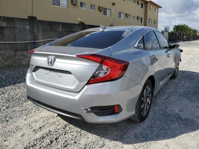 Photo 4 from auction – 2018 HONDA CIVIC EX with VIN 2HGFC2F77JH589645