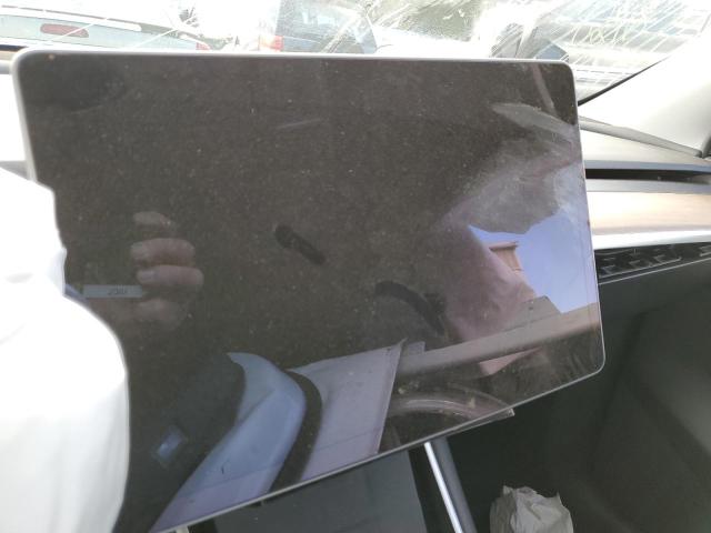 Photo 8 from auction – 2021 TESLA MODEL Y with VIN 5YJYGDED0MF105601
