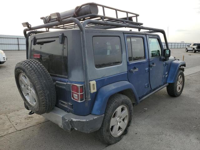 Photo 4 from auction – 2009 JEEP WRANGLER U with VIN 1J8GA59189L780287