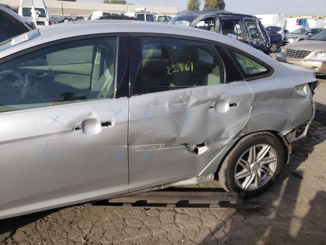 Photo 9 from auction – 2014 FORD FOCUS SE with VIN 1FADP3F29EL150613