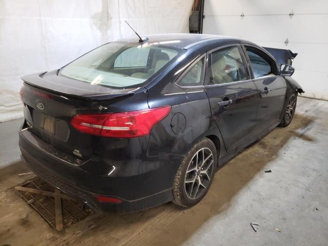 Photo 4 from auction – 2015 FORD FOCUS SE with VIN 1FADP3FE9FL339435