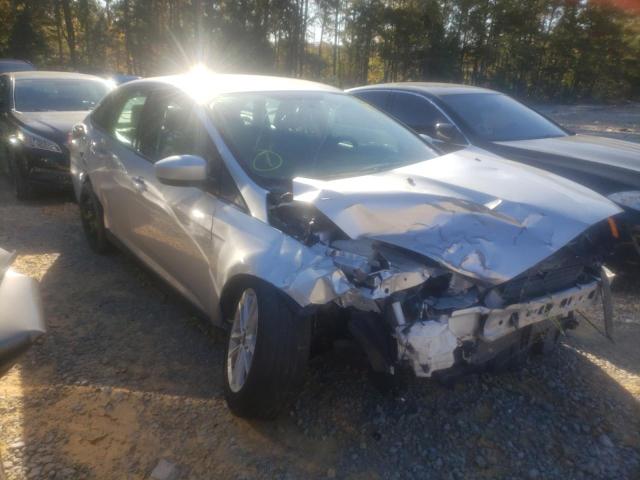 FORD FOCUS SE 2018 with VIN 1FADP3F21JL206957 - Photo from auction