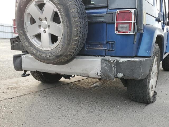Photo 9 from auction – 2009 JEEP WRANGLER U with VIN 1J8GA59189L780287