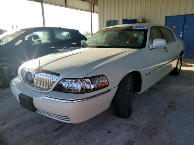 Photo 2 from auction – 2004 LINCOLN TOWN CAR U with VIN 1LNHM83W44Y638082