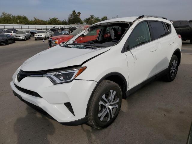Photo 2 from auction – 2018 TOYOTA RAV4 LE with VIN JTMZFREV3JJ743780