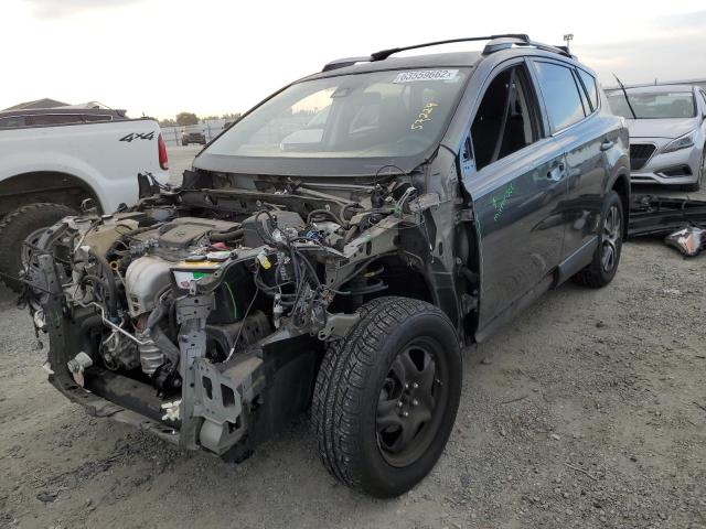 Photo 2 from auction – 2017 TOYOTA RAV4 LE with VIN JTMZFREV5HJ713089