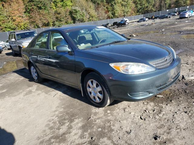 TOYOTA CAMRY LE 2003 with VIN 4T1BE30KX3U759440 - Photo from auction
